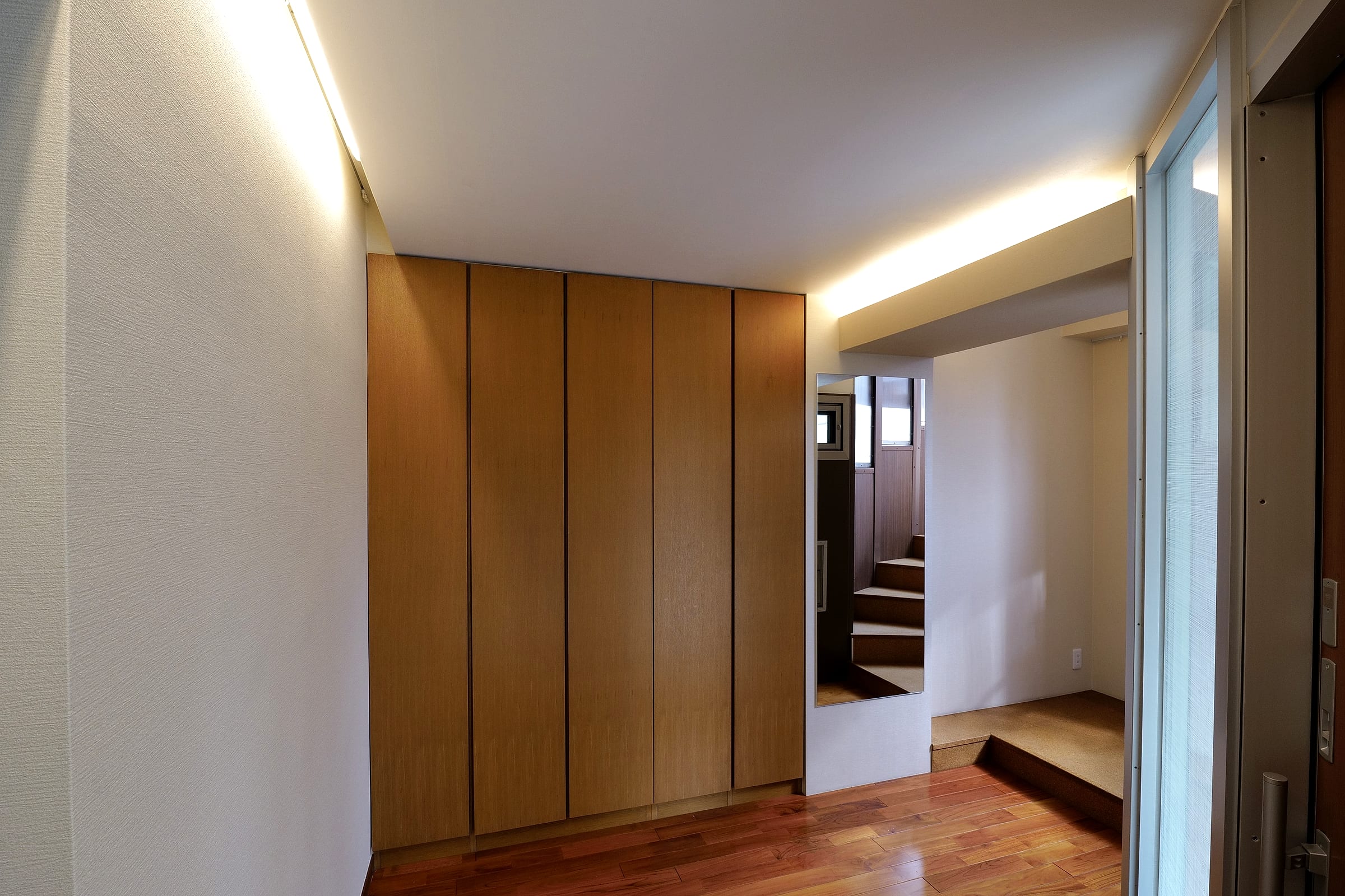 Built-in shoe storage at the entry